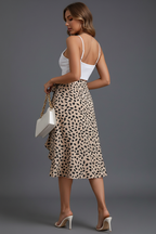Beige tan midi skirt with black abstract leopard print back angle
