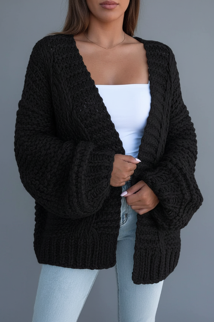 Black chunky knit cardigan brunette model front view