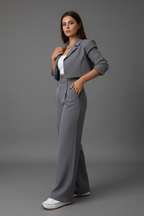 Grijs pak - hand bij blazer