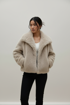 Model casual pose - beige teddy fleece jacket