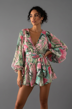 Pink and green floral print romper playsuit different model grey background